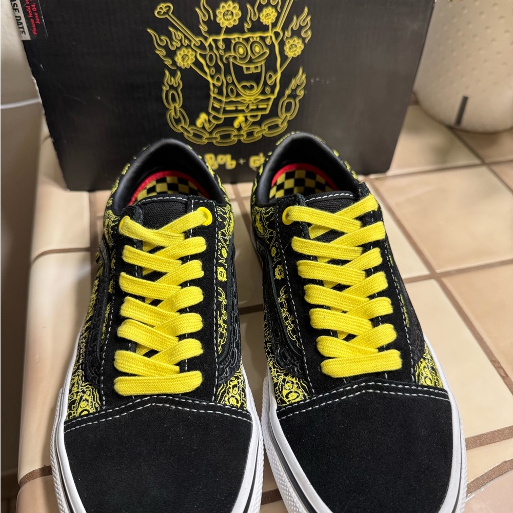 Vans Black and Yellow Graphic Sneakers